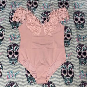 I am selling a fashion nova one piece size large women’s